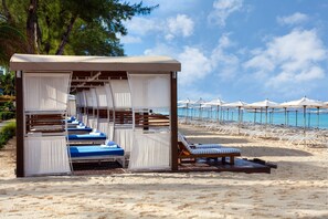 Private beach nearby, white sand, beach cabanas, sun-loungers