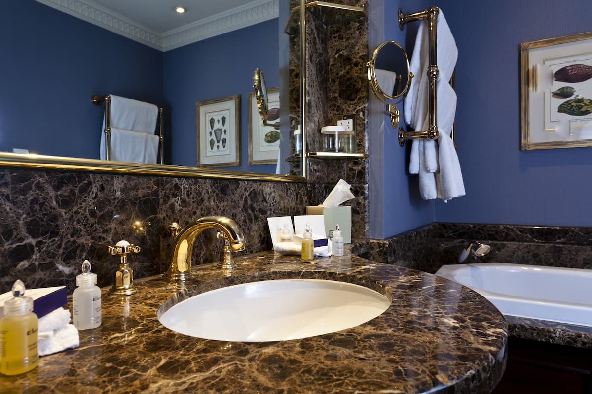 presidential suite | bathroom | shower, hair dryer, bathrobes, towels