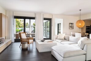 Five Bedroom Garden Villa at Rendezvous Beach | Living area | 55-inch LCD TV with cable channels, TV, Netflix
