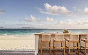 Oceanfront Double Junior Suite at Merrywing Beach | Premium bedding, minibar, in-room safe, individually decorated