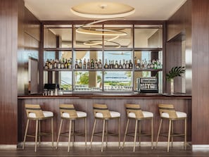 2 bars/lounges, 2 poolside bars, 2 beach bars