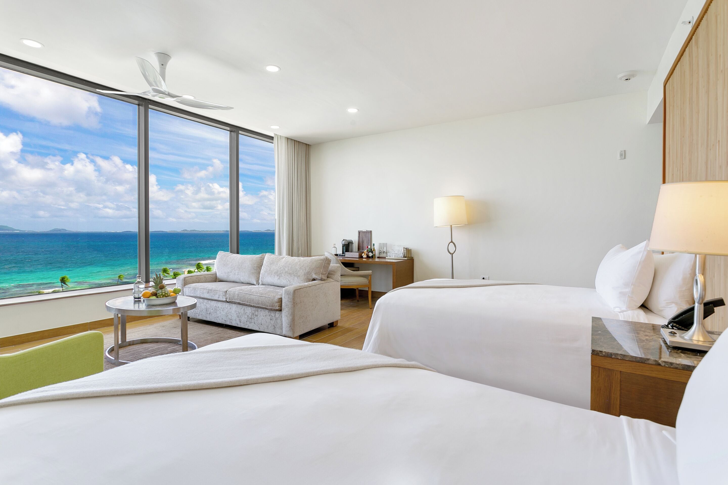 ocean view double deluxe room at merrywing tower | premium bedding, minibar, in-room safe, individually decorated