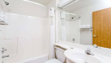 Combined shower/tub, rainfall showerhead, hair dryer, towels