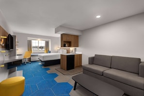 Suite, 1 grand lit, non-fumeurs | Literie de qualité supérieure, couette en duvet d'oie, bureau