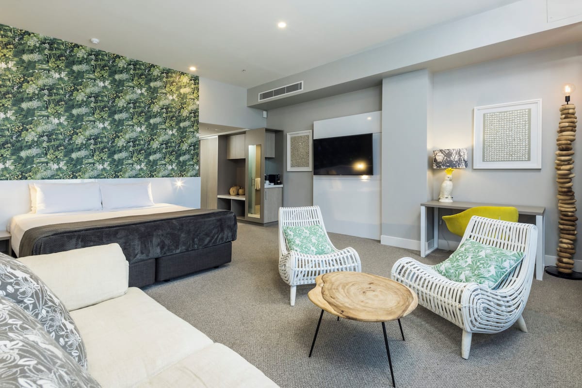 Executive Luxury Suite | In-room safe, blackout drapes, iron/ironing board, free WiFi