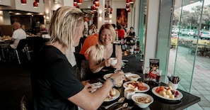 Daily buffet breakfast (AUD 25 per person)