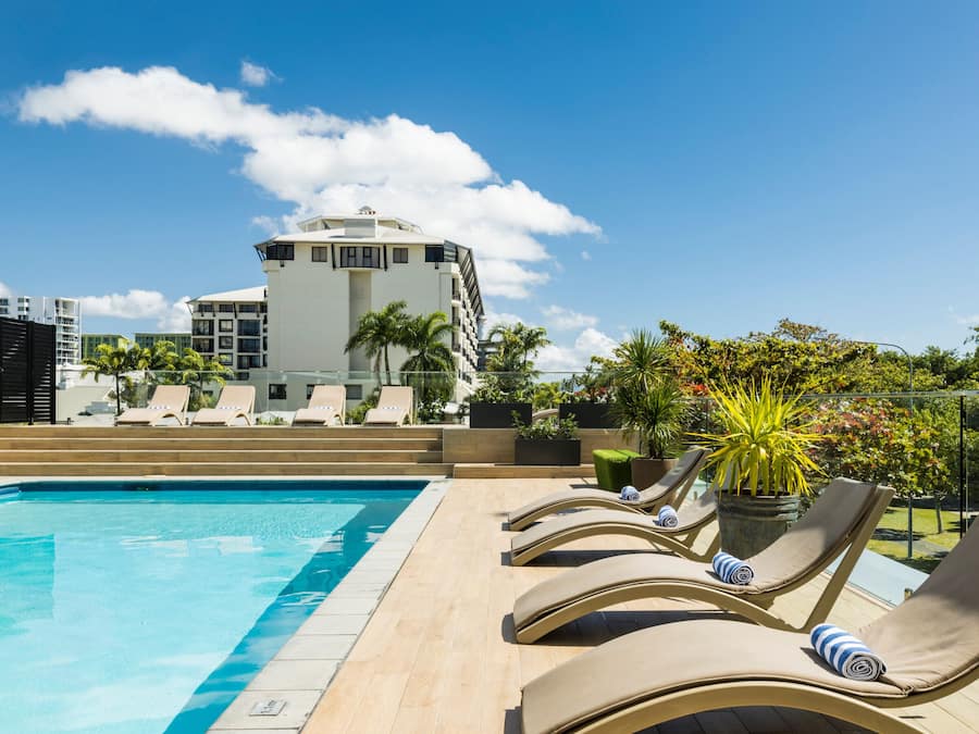 Outdoor pool, pool umbrellas, sun loungers