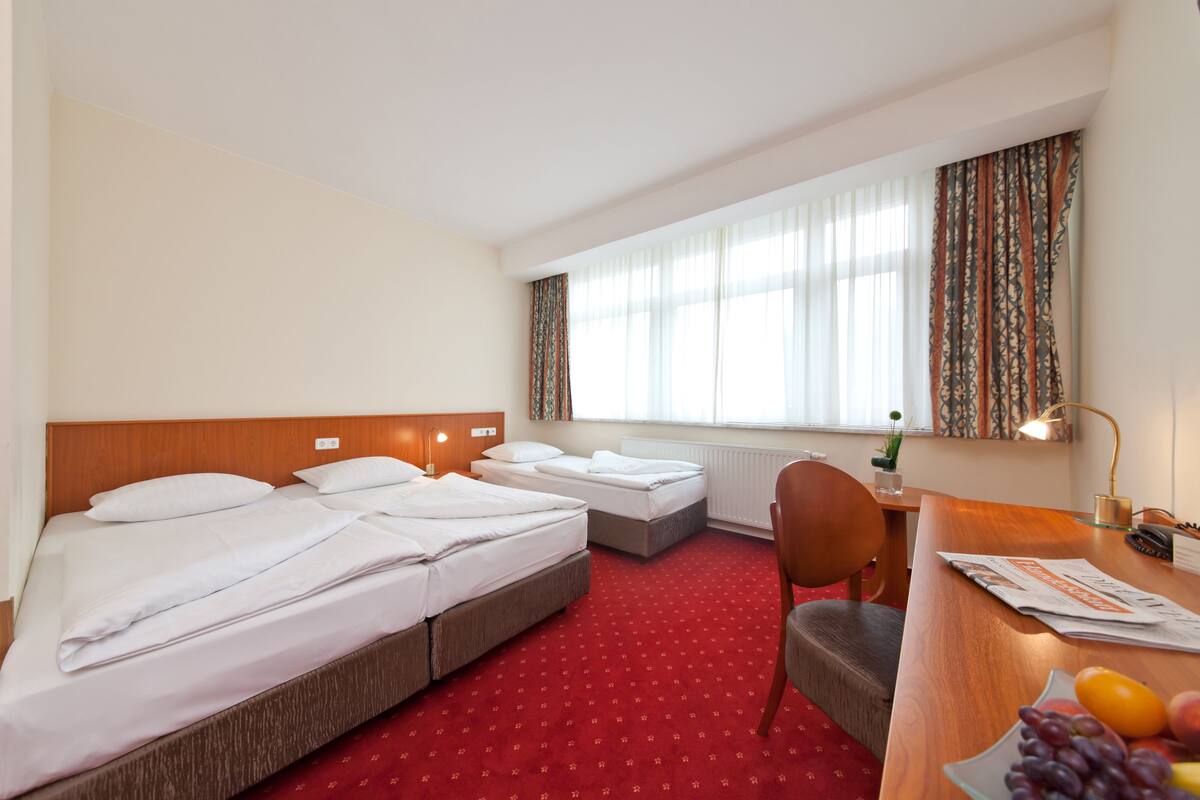 Hypoallergeen beddengoed, een kluis op de kamer, een bureau