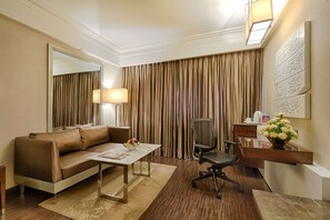 Premium bedding, free minibar items, in-room safe, desk