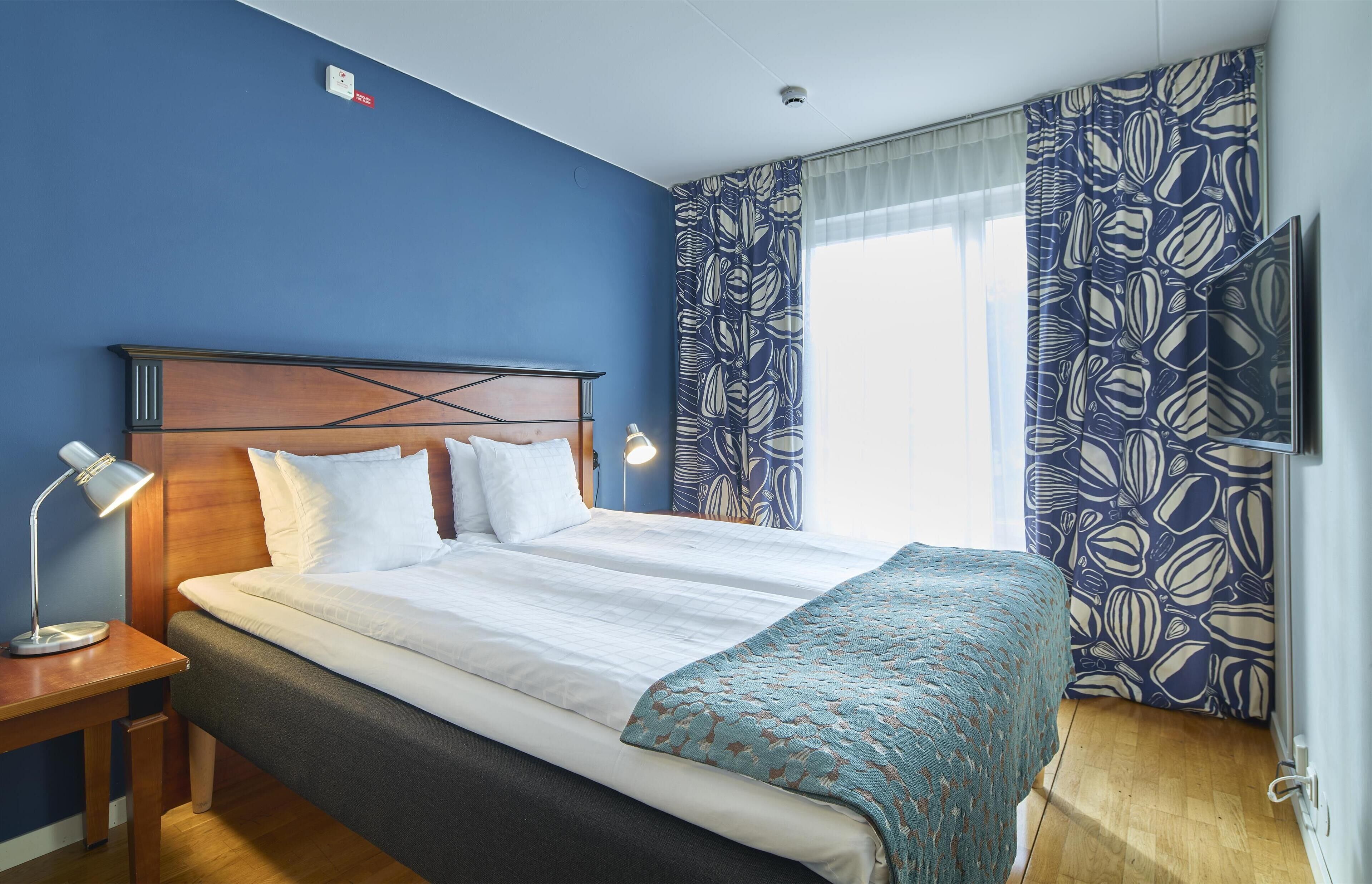 Economy Room, 1 Queen Bed | Iron/ironing board, free cots/infant beds, free WiFi, bed sheets