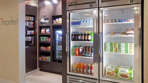 A refrigerated display case with various beverages and snacks. - Residence Inn by Marriott Boulder Broomfield (Louisville)
