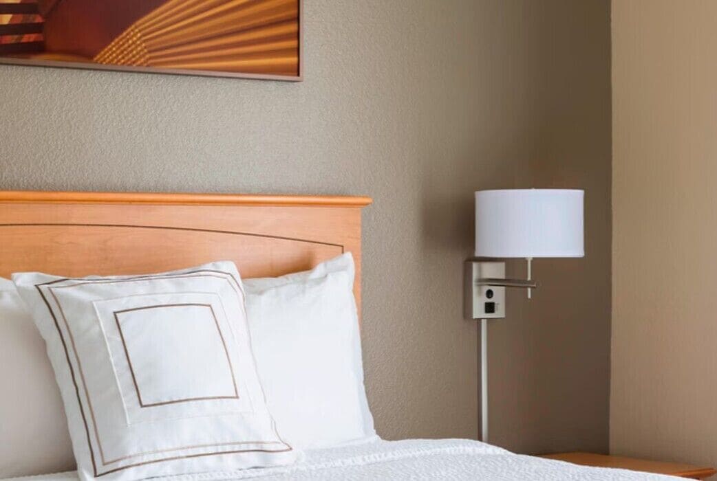 premium bedding, down duvets, desk, laptop workspace