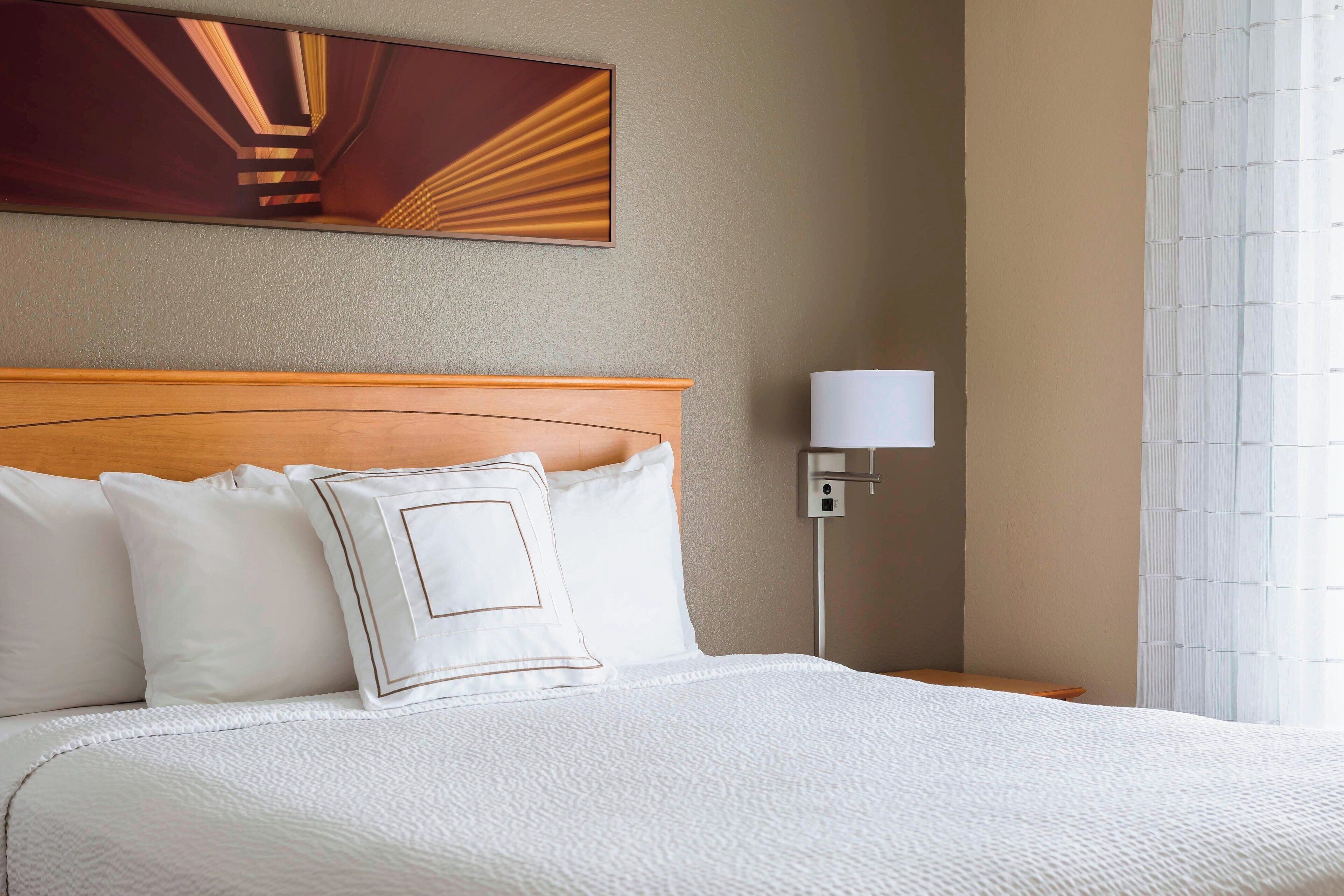 premium bedding, down duvets, desk, laptop workspace