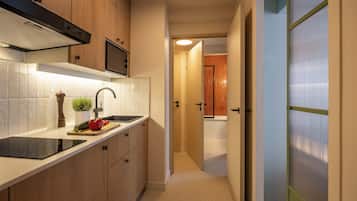 Apartment, 1 bedroom | Private kitchen | Fridge, microwave, stovetop, dishwasher