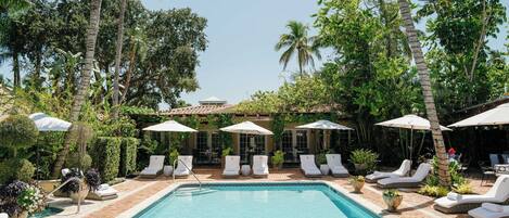 Outdoor pool, free pool cabanas, pool umbrellas