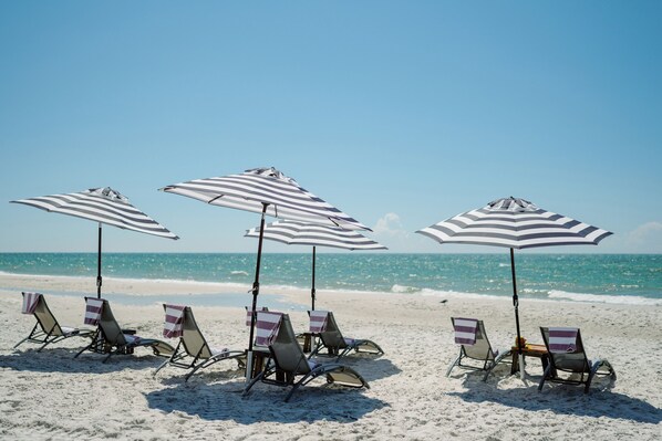 Private beach, white sand, free beach shuttle, sun-loungers