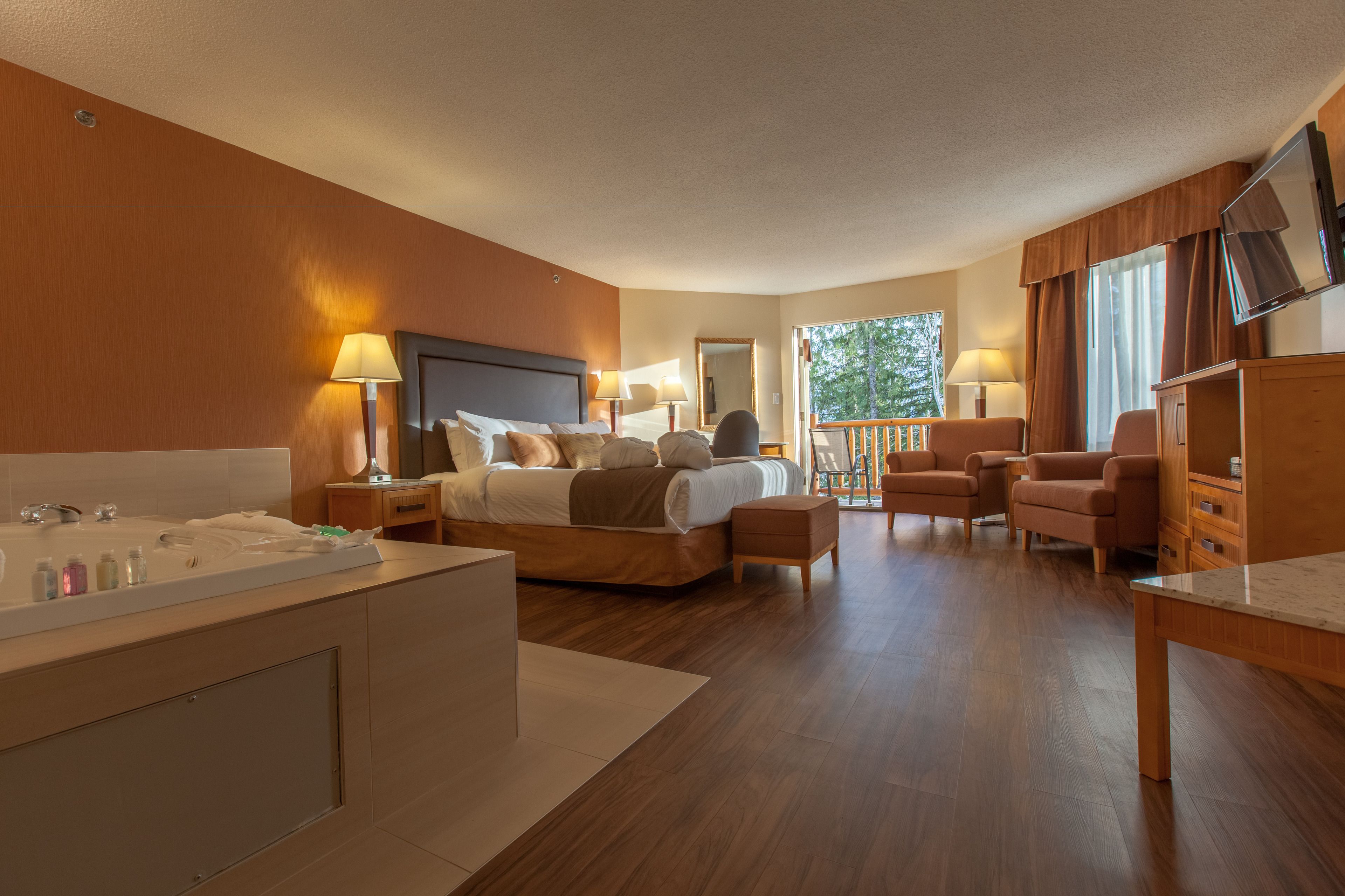 studio suite (coast premium suite with jet tub) | 1 bedroom, in-room safe, desk, iron/ironing board