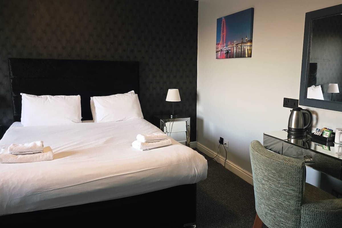 In-room safe, desk, laptop workspace, iron/ironing board