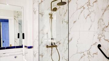 Triple Room, Multiple Beds (UA, Wet) | Bathroom | Shower, hair dryer, towels