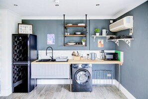 Triple Room, Multiple Beds (UA, Wet) | Private kitchen | Coffee/tea maker, electric kettle