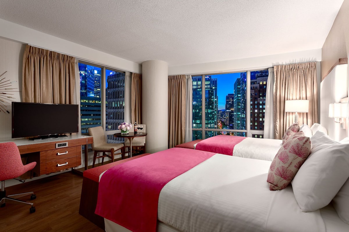 Premium bedding, pillow-top beds, in-room safe, desk