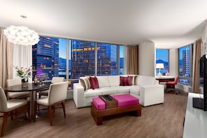 Deluxe Suite, 1 King Bed with Sofa bed, Harbor View | Living room | 32-inch flat-screen TV with cable channels, TV, MP3 dock