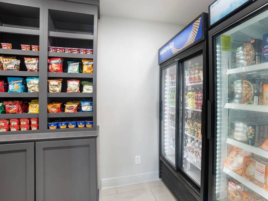 A snack and beverage section with various packaged snacks and drinks.
