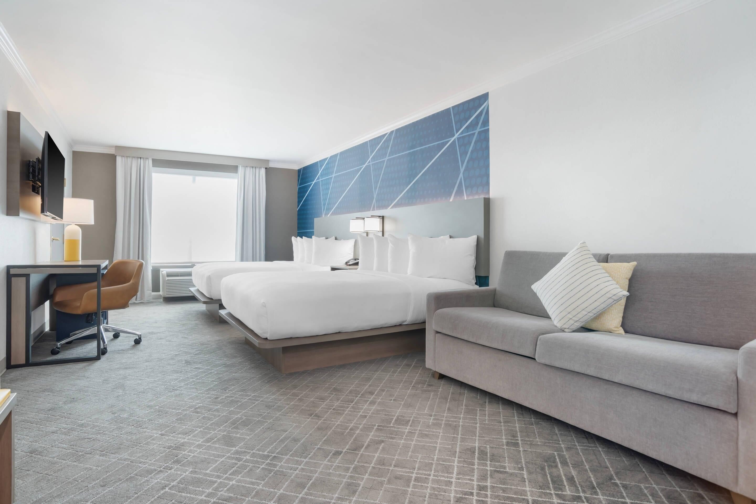 Premium bedding, down duvets, pillow-top beds, in-room safe