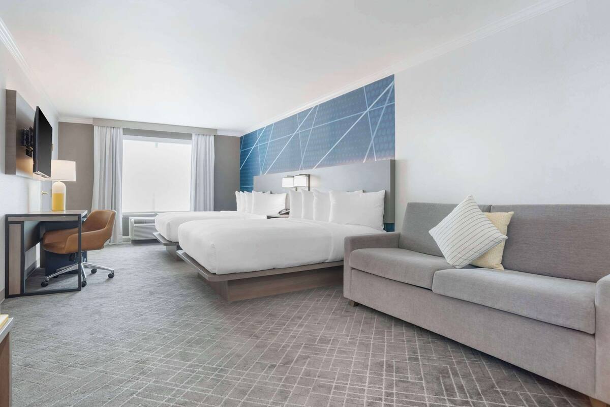 suite, 2 queen beds, non smoking | premium bedding, down duvets, pillow-top beds, in-room safe