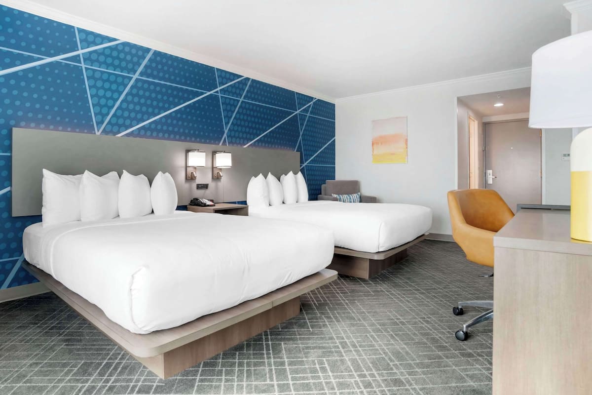 premium bedding, down duvets, pillow-top beds, in-room safe