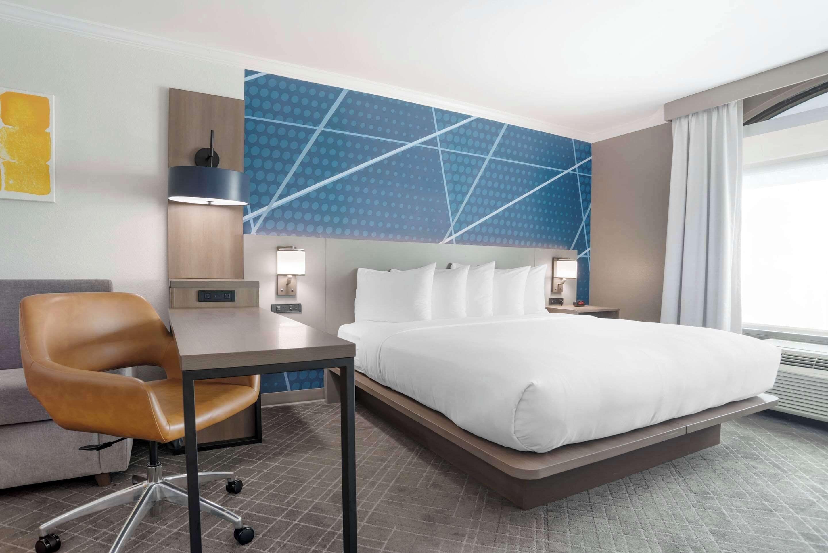 premium bedding, down duvets, pillow-top beds, in-room safe