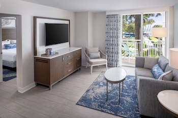In-room safe, individually decorated, individually furnished, desk at The Reach Key West, Curio Collection by Hilton
