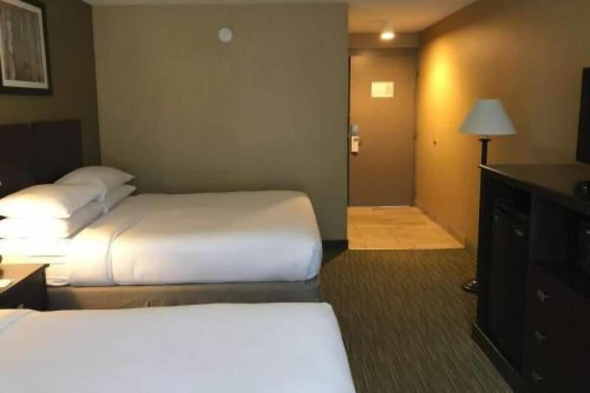 Premium bedding, pillow-top beds, desk, blackout curtains