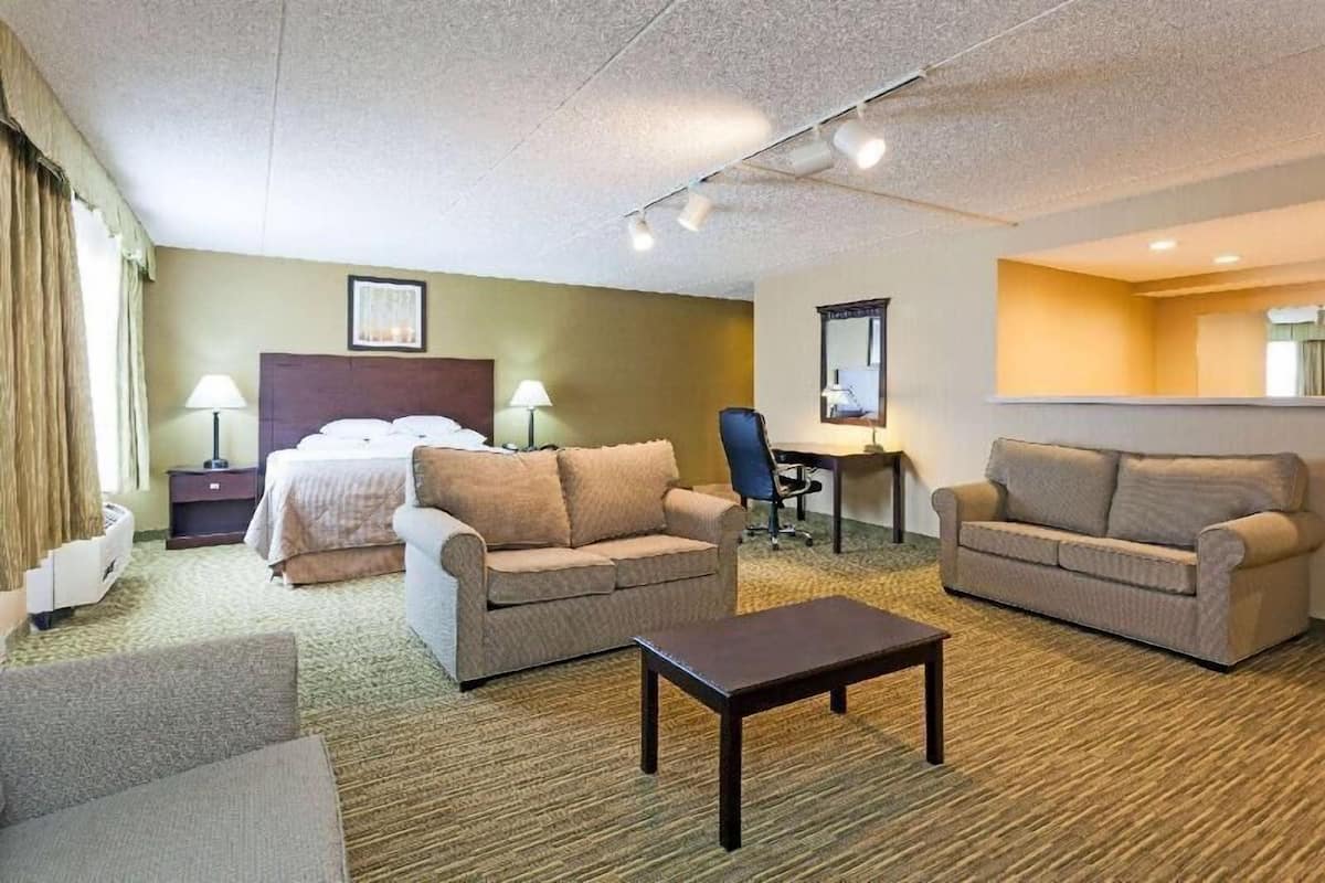 Premium bedding, pillow-top beds, desk, blackout curtains