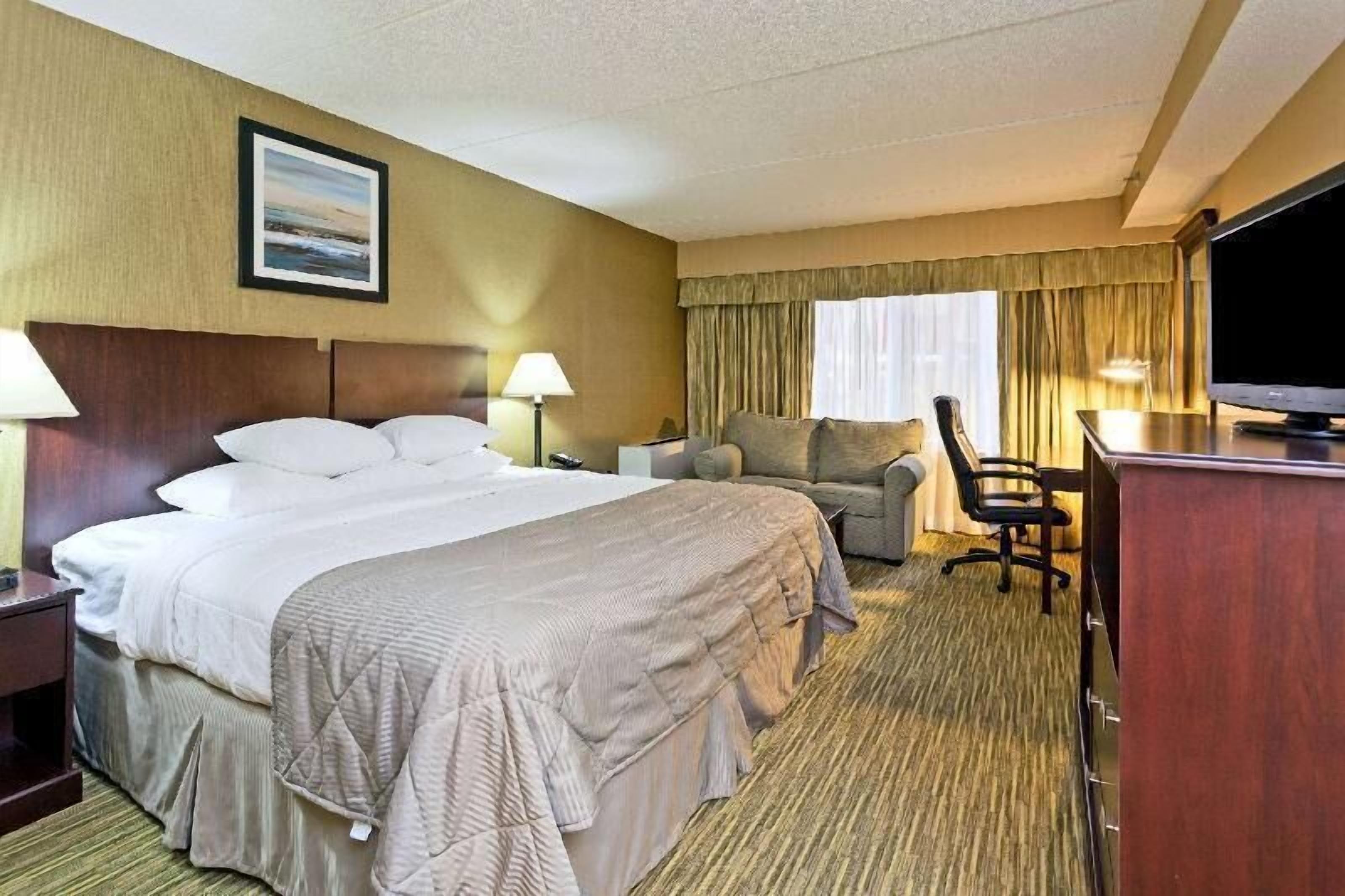 Premium bedding, pillow-top beds, desk, blackout curtains