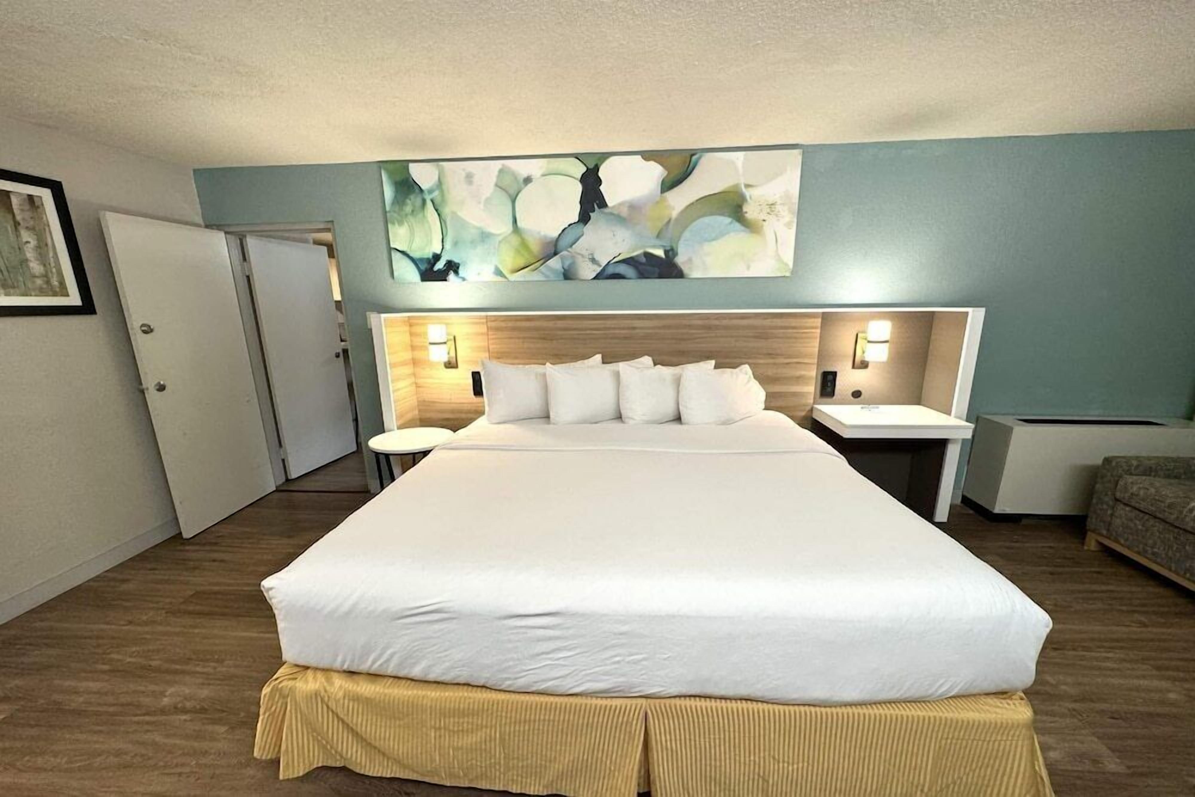 Premium bedding, pillow-top beds, desk, blackout curtains