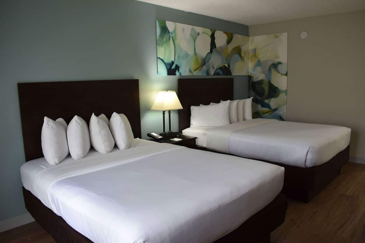 Premium bedding, pillow-top beds, desk, blackout curtains