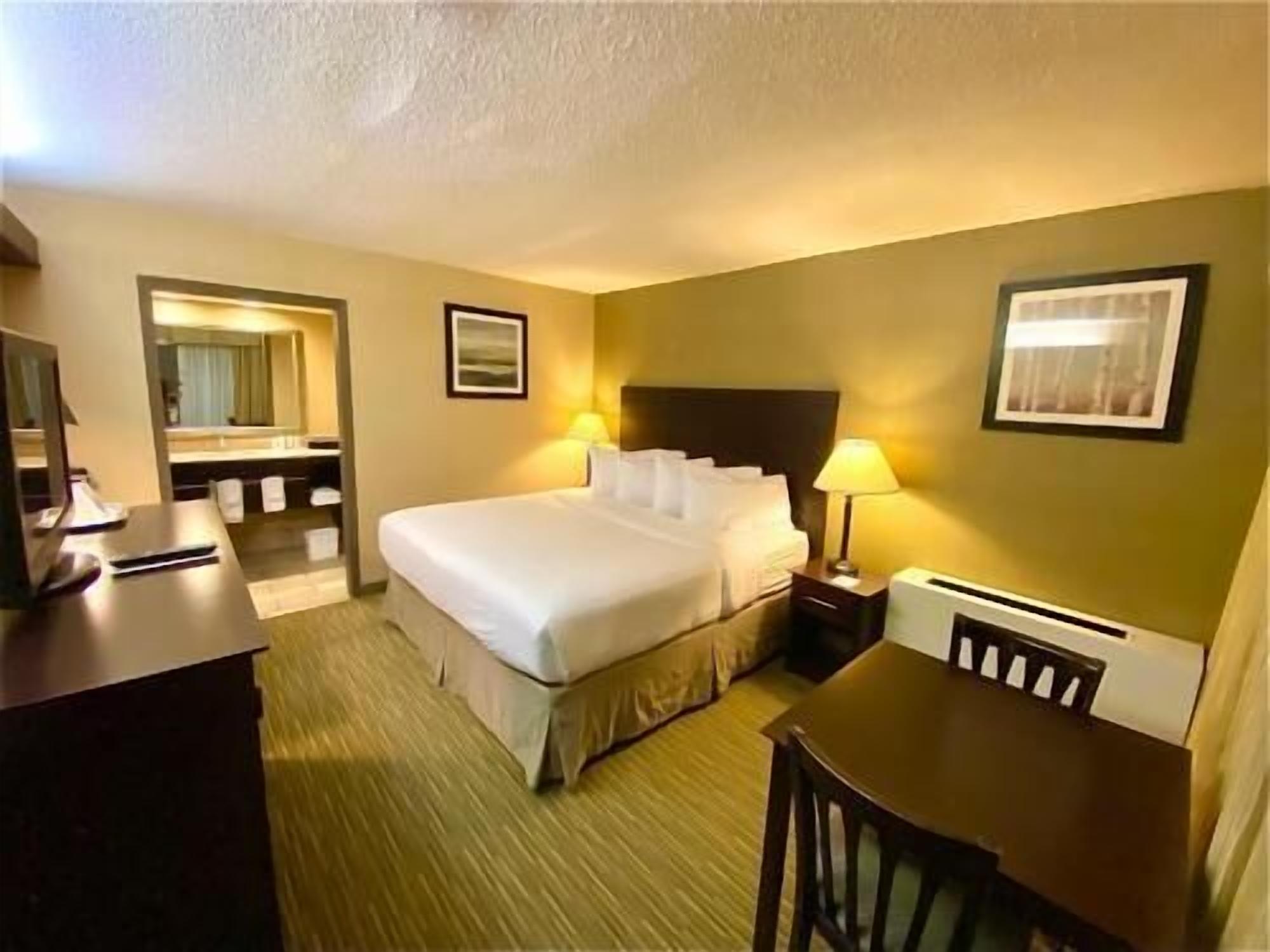 Premium bedding, pillow-top beds, desk, blackout curtains