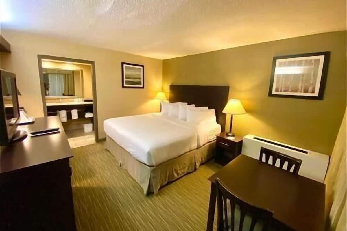 Premium bedding, pillow-top beds, desk, blackout curtains