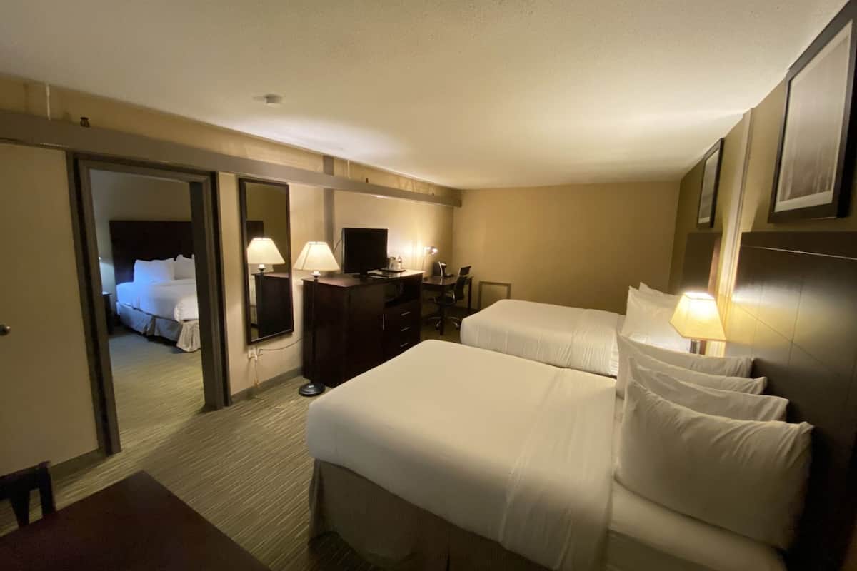 Premium bedding, pillow-top beds, desk, blackout curtains