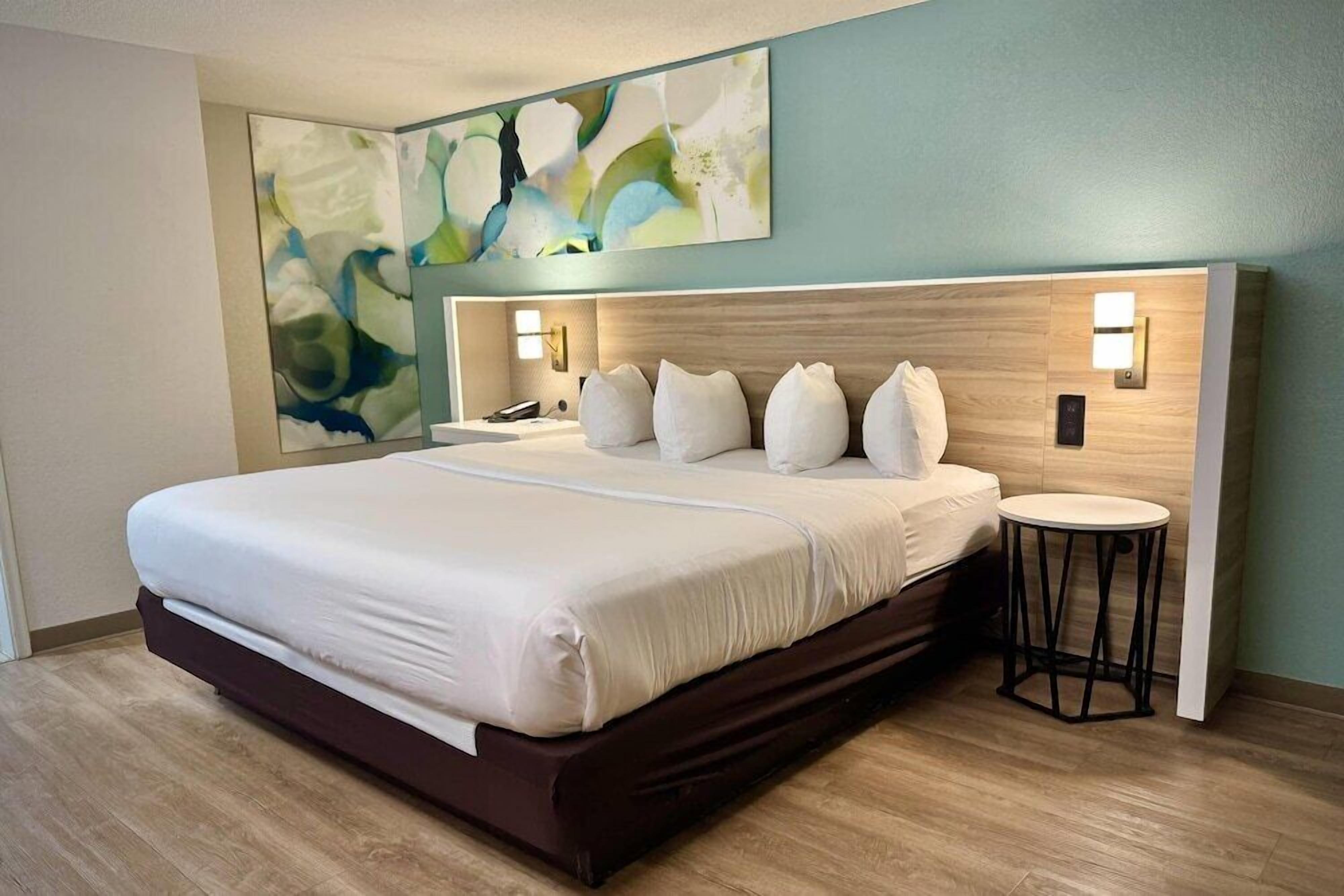 Premium bedding, pillow-top beds, desk, blackout curtains
