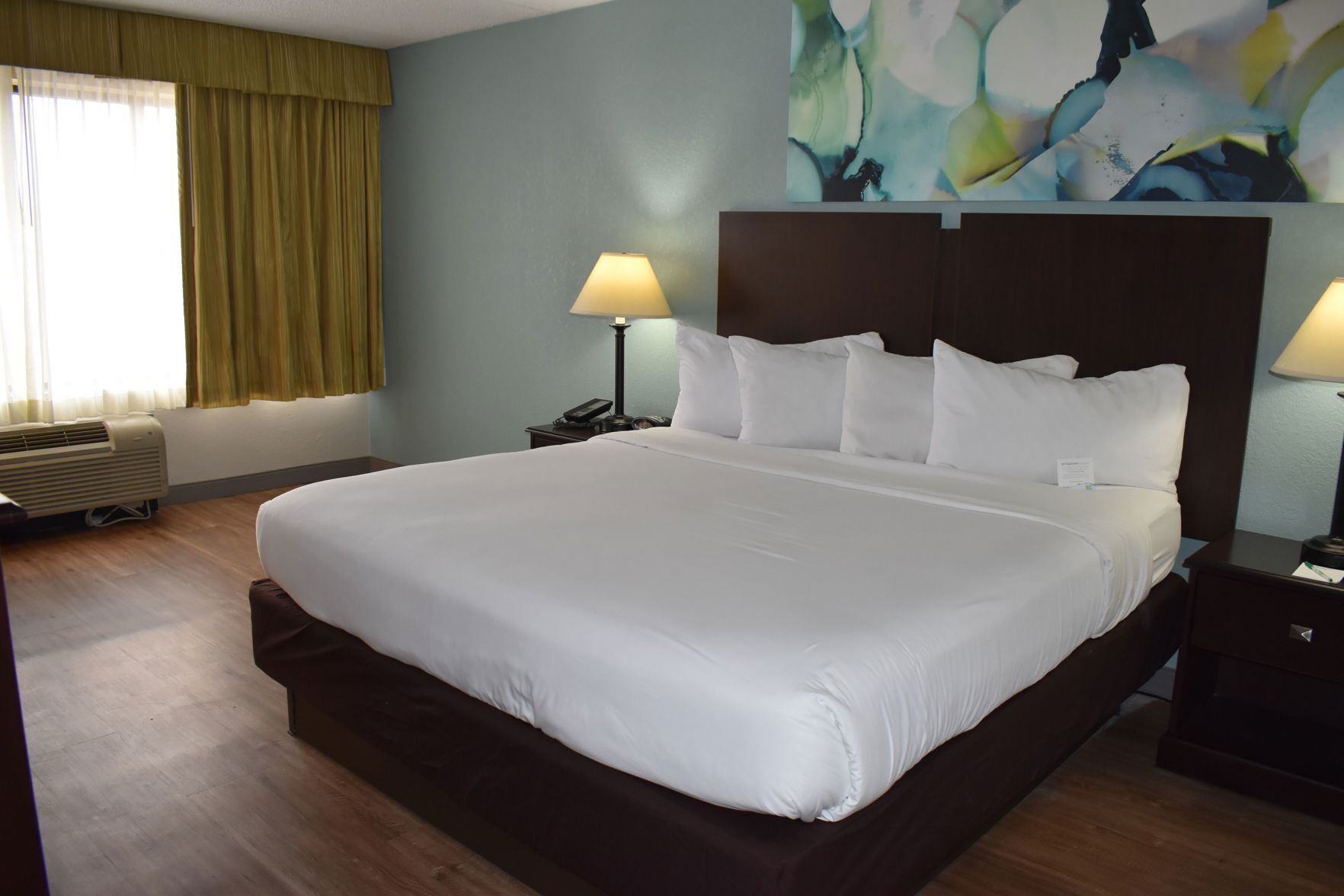 Premium bedding, pillow-top beds, desk, blackout curtains