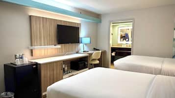 Premium bedding, pillowtop beds, desk, blackout drapes
