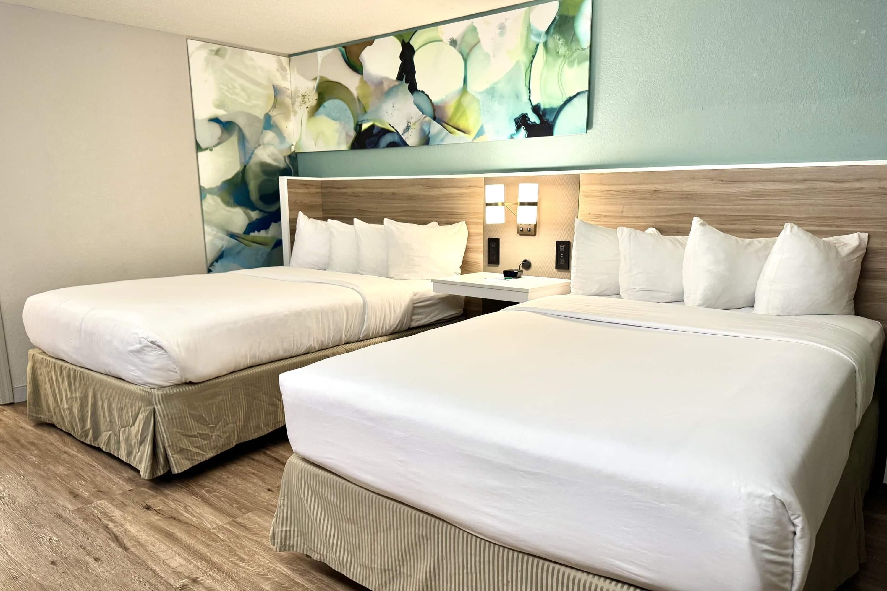 Premium bedding, pillow-top beds, desk, blackout curtains