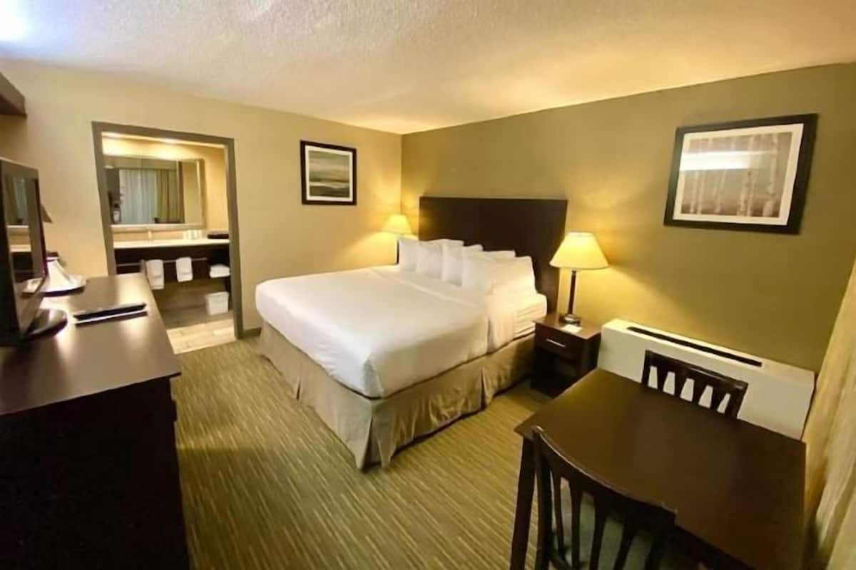 Premium bedding, pillow-top beds, desk, blackout curtains