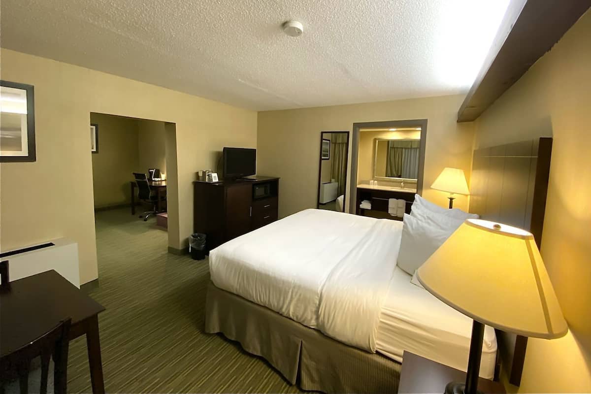 Premium bedding, pillow-top beds, desk, blackout curtains