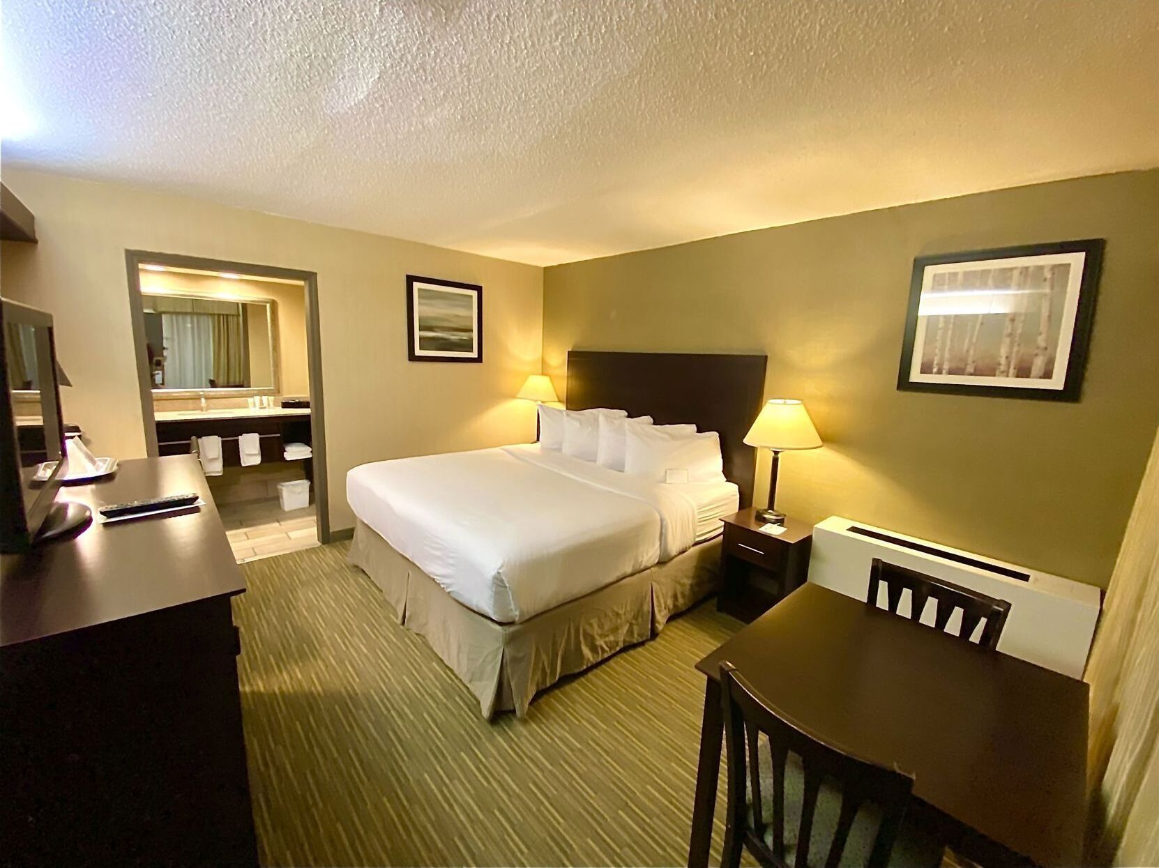 Premium bedding, pillow-top beds, desk, blackout curtains