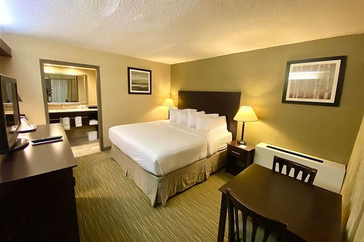 Premium bedding, pillow-top beds, desk, blackout curtains