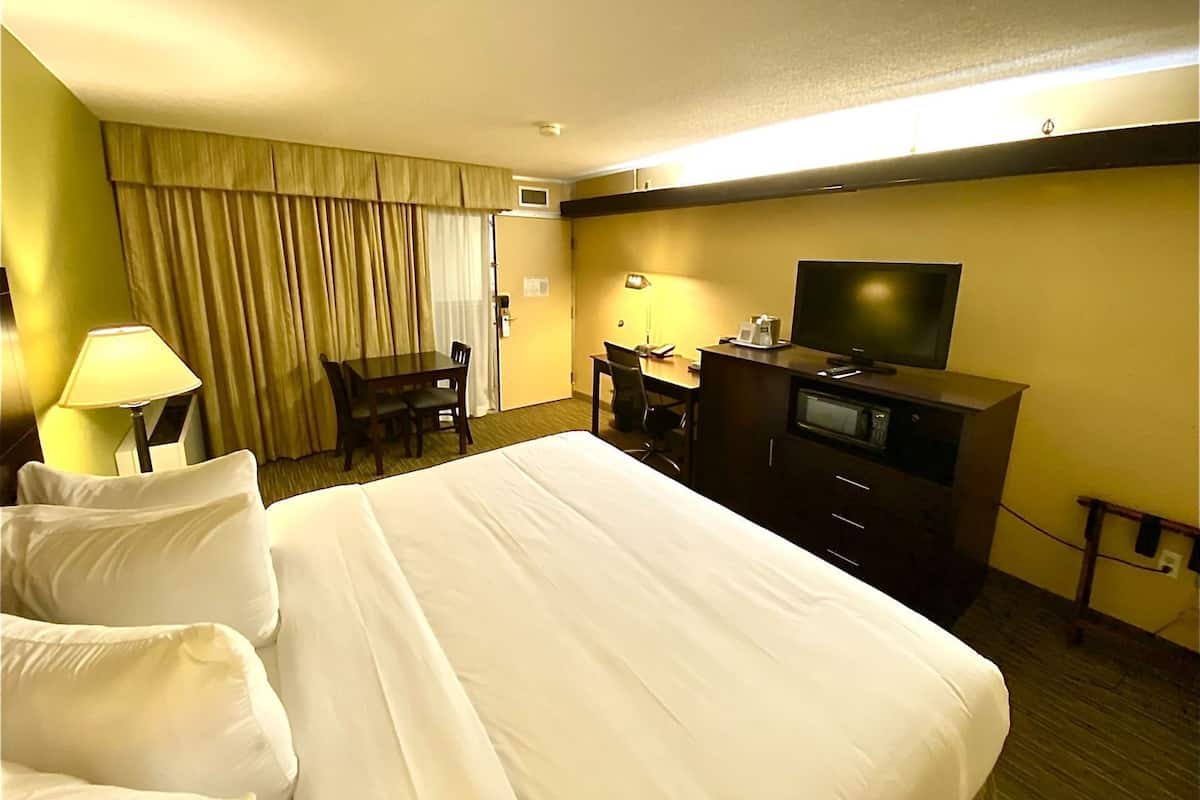 Premium bedding, pillow-top beds, desk, blackout curtains