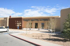 Stylish building with a flat roof and large windows.